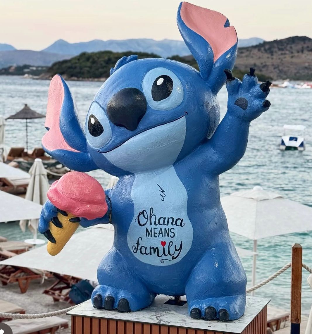 Exterior of Ohana Beach Bar in Albania with tropical decor, warm lighting, and a stylish entrance designed as a popular photo spot by the beach. Palm details, lounge seating, and coastal vibes make it a standout destination among beach bars and clubs in Albania.
