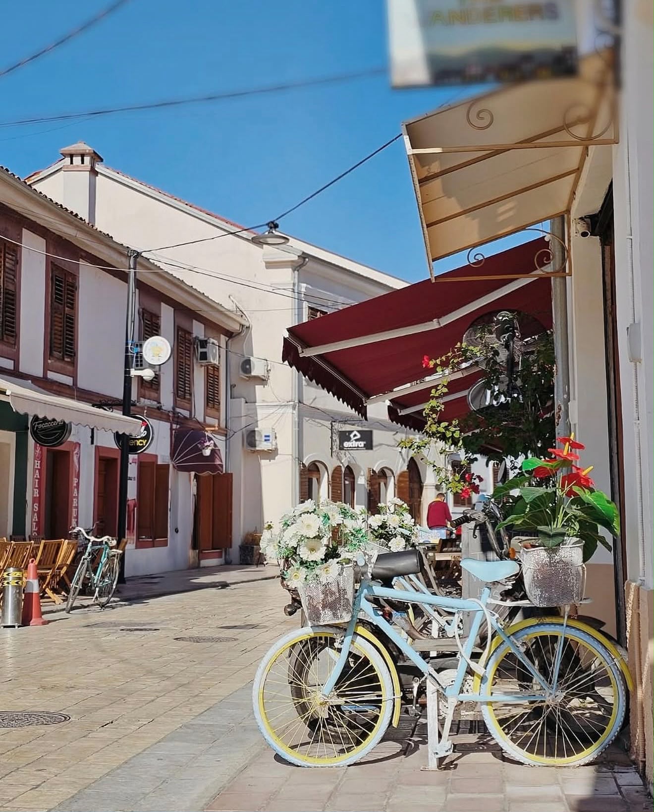 Shkodra City spreads across the landscape of northern Albania with historic buildings, streets, and mountain views surrounding the urban area. The city is a gateway to the Albanian Alps and a common starting point for exploring the region.