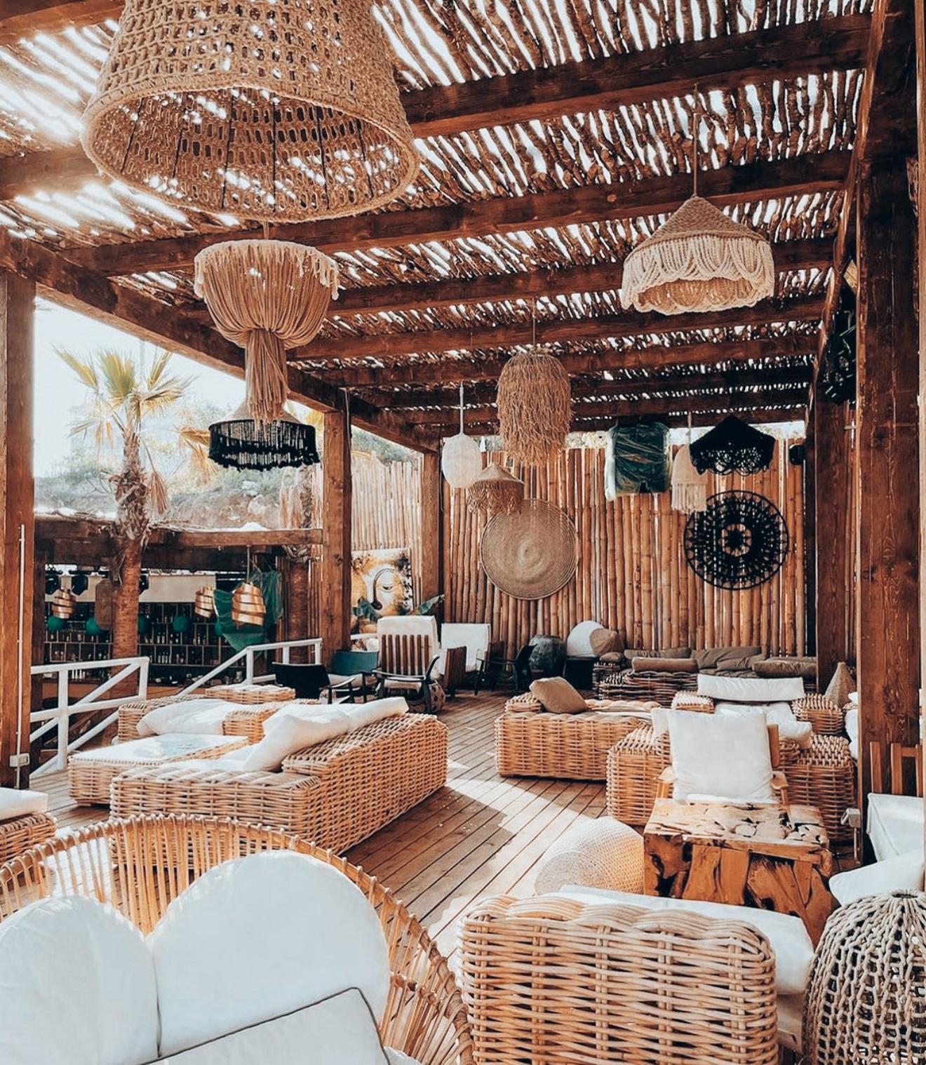 Cozy restaurant interior in Ksamil with neatly set tables, warm lighting, and inviting decor for diners. A welcoming place to enjoy a meal during 2 Days in Ksamil after exploring the nearby beaches.